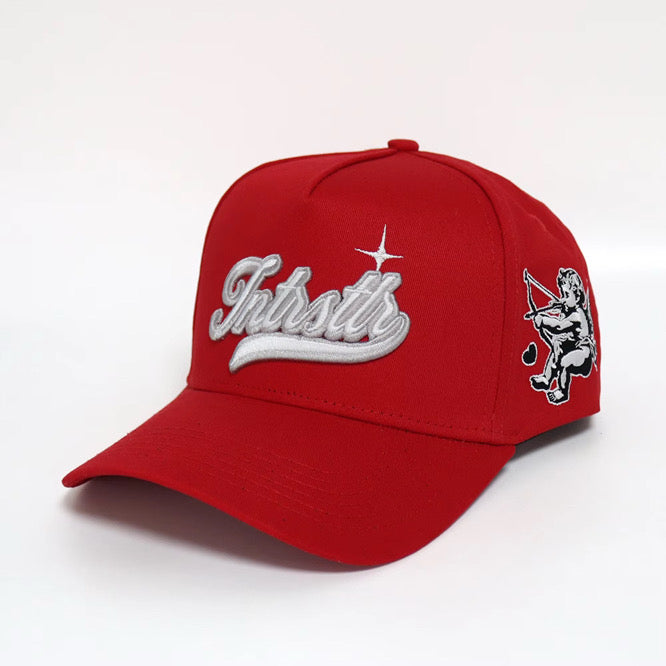 INTRSTLR “Cupid Hustle” Cap – Rojo Carmesí